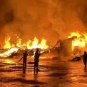 Нічний обстріл: у Київській області загорілися склади та приватна оселя
