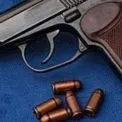 Пістолет «у стволі» та 317 патронів: затриманому на Київщині загрожує до семи років в’язниці