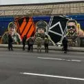 Дарницьке шосе стало місцем пам’яті: у Києві відкрили мурали полеглим бійцям