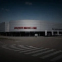 Російський удар пошкодив автосалон Porsche на Київщині: що відомо