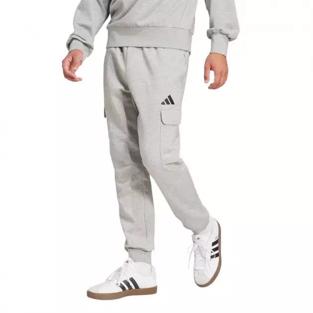 Городской ритм и комфорт: почему спортивные штаны Adidas стали частью киевского лайфстайла - 1